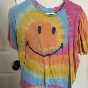 rainbow tie-dye shirt with a smiley face on it